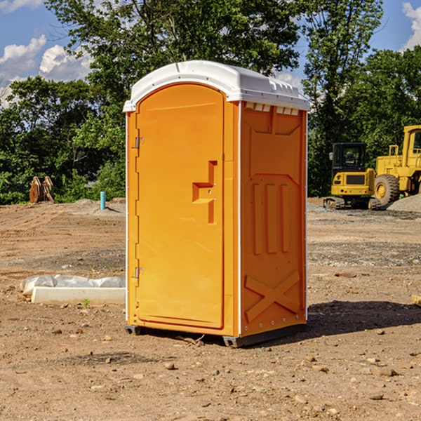 how often are the portable restrooms cleaned and serviced during a rental period in Rosholt